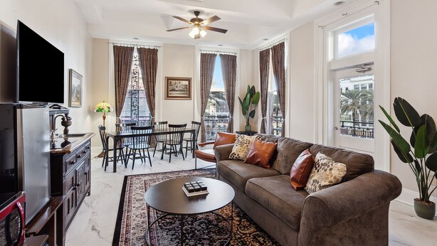Two Bedroom Suite | Living area | 40-inch flat-screen TV with cable channels, TV - Maison Pierre Lafitte (New Orleans)
