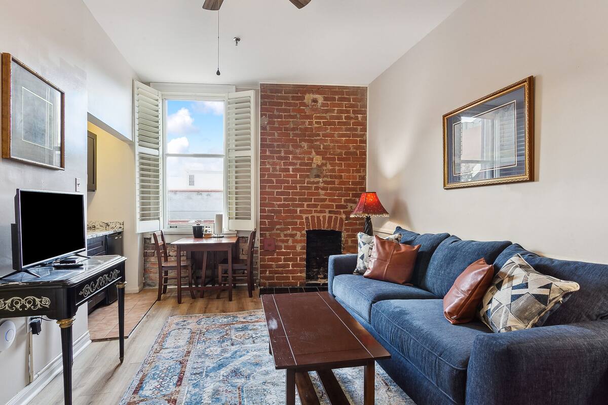 One Bedroom Suite | Living area | 40-inch flat-screen TV with cable channels, TV
