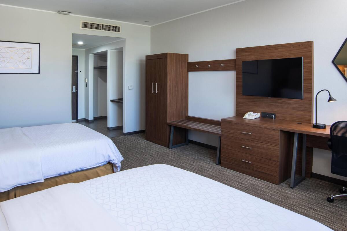 In-room safe, desk, iron/ironing board, cribs (free)