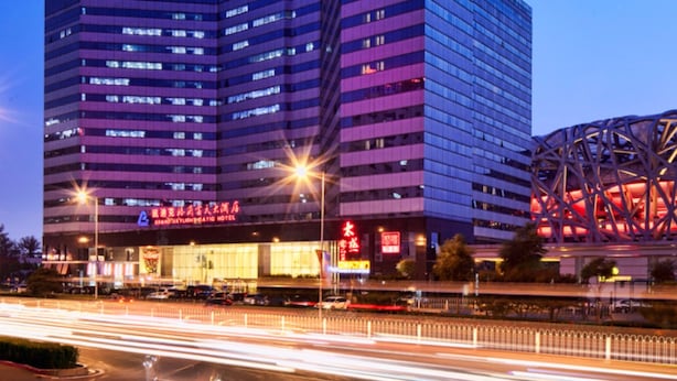 A modern hotel with multiple floors and a prominent 'CATIC' sign on the building. - Grand Skylight Catic Hotel Beijing (Beijing)