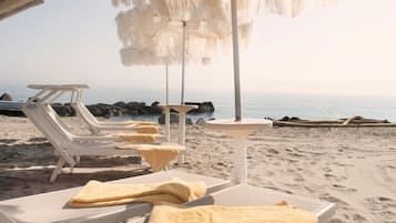 Private beach, sun-loungers, beach umbrellas, beach bar