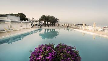 Seasonal outdoor pool, pool umbrellas, sun loungers