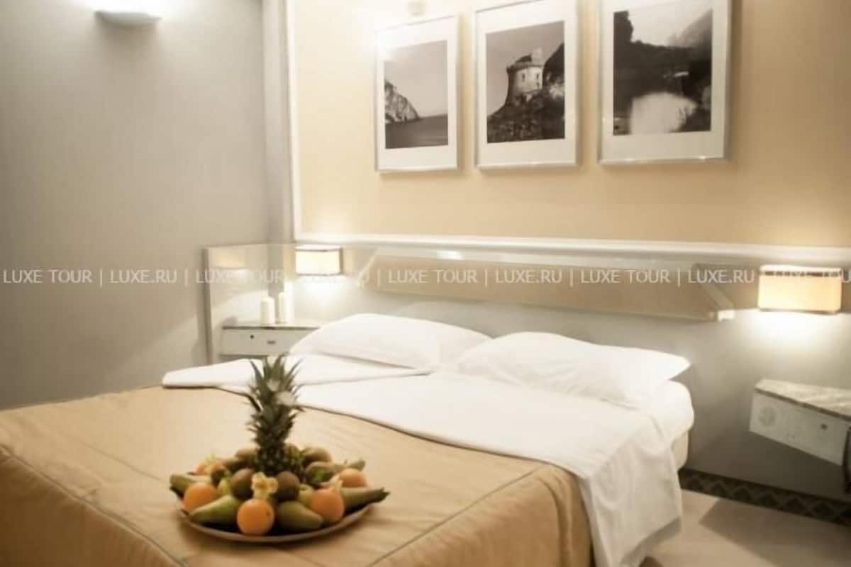 Luxe beddengoed, een minibar, een kluis op de kamer, een bureau