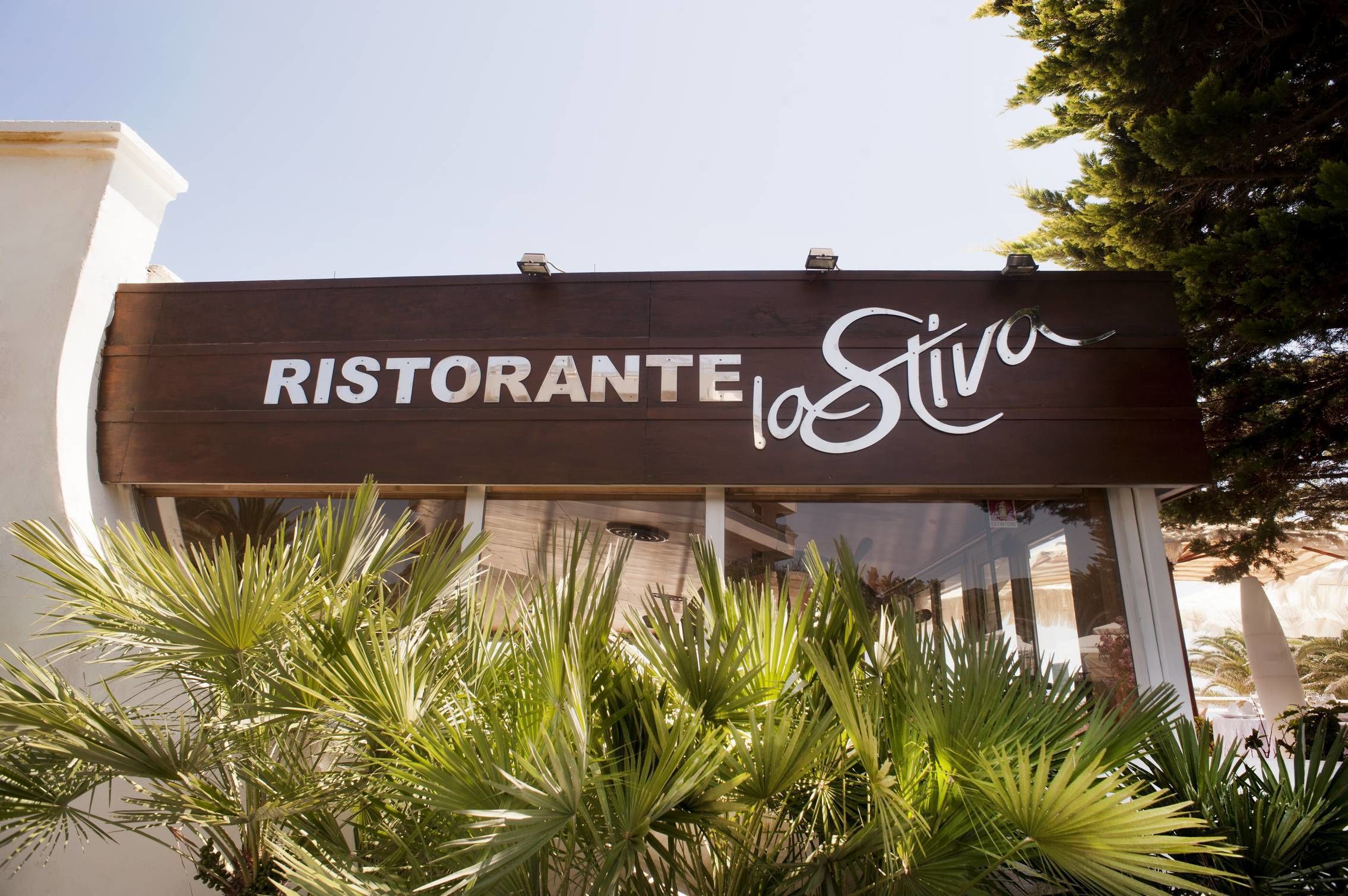 A sign for "RISTORANTE La Stella" with a clear view of the restaurant's name.