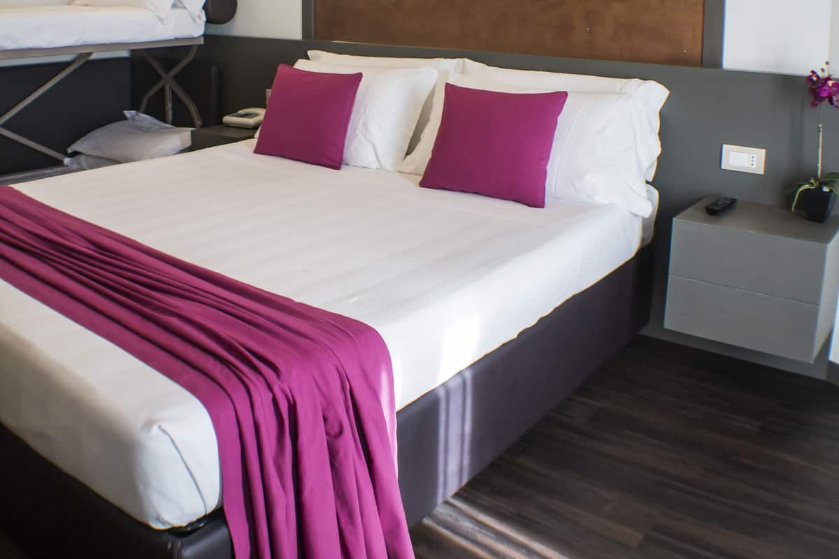 Premium bedding, down comforters, minibar, in-room safe