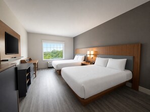 A hotel room with two beds, a desk, a television, and a window with a view. - Country Inn & Suites by Radisson, Pensacola West, FL (Pensacola)