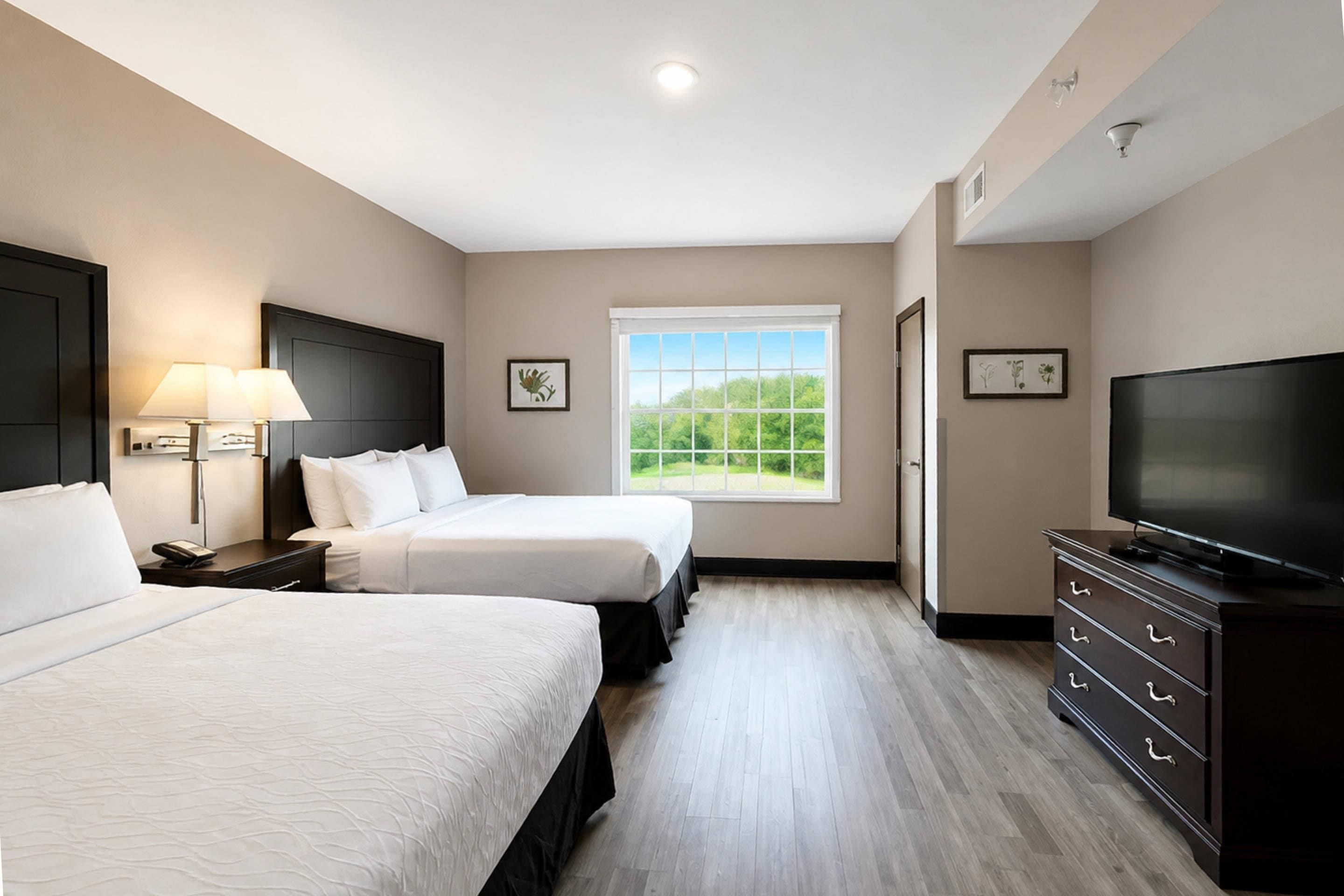 Suite, 1 Bedroom, Non Smoking | Down comforters, desk, laptop workspace, blackout drapes