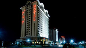 A multi-story hotel with a prominent 'HOTEL' sign on the facade. - WOW Airport Hotel (Istanbul)