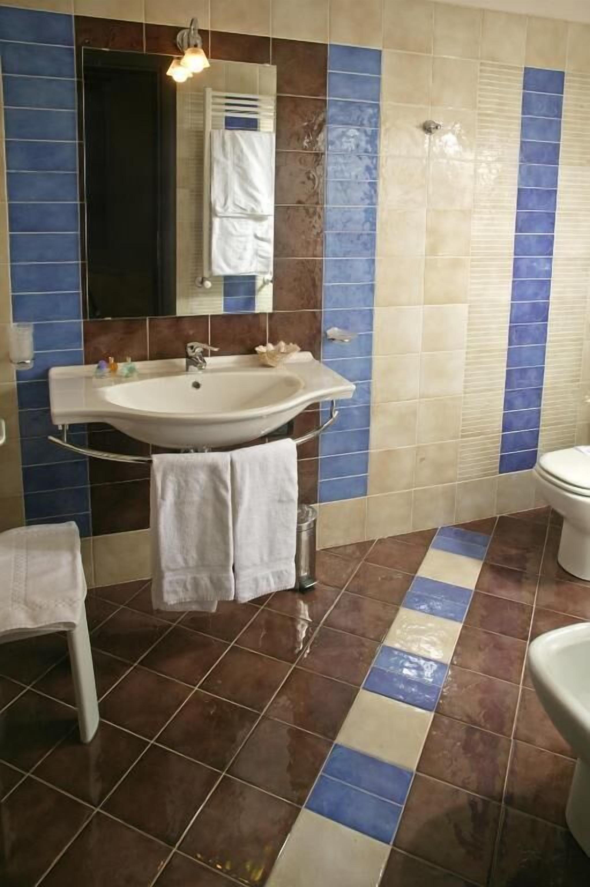 free toiletries, hair dryer, bidet, towels