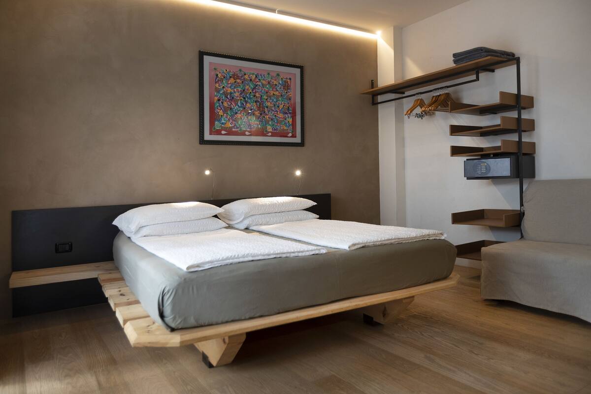 Family Room, Patio, Partial Lale View | Premium bedding, down comforters, minibar, in-room safe