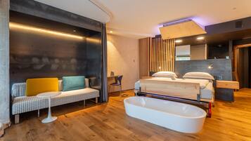 Junior Suite | 1 camera, biancheria da letto di alta qualità, copriletto in piuma