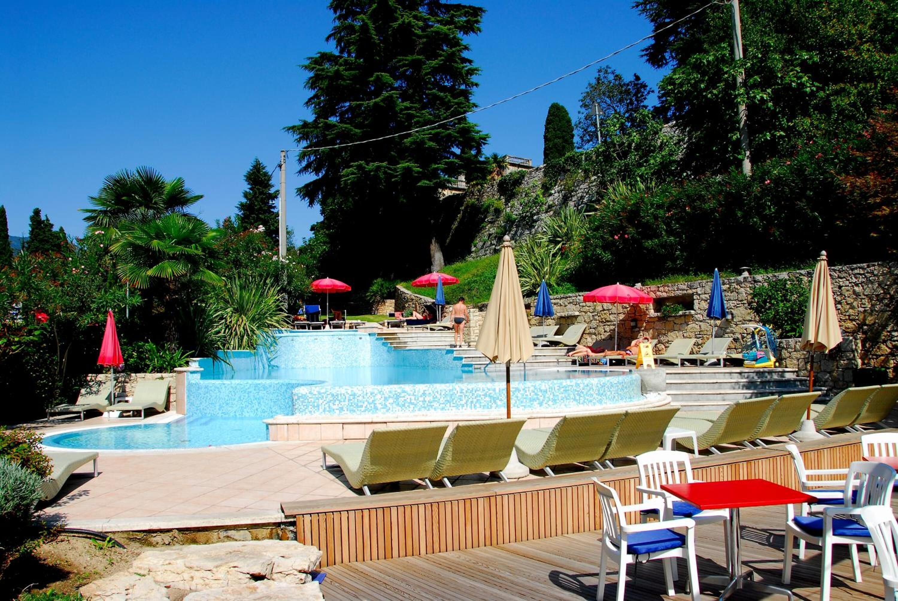 outdoor pool, pool loungers