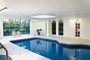 Indoor pool, outdoor pool, pool umbrellas, sun loungers