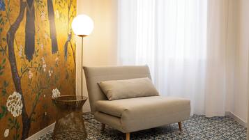 Suite with two balconies | Living area | 40-inch LCD TV with satellite channels, TV, first-run movies