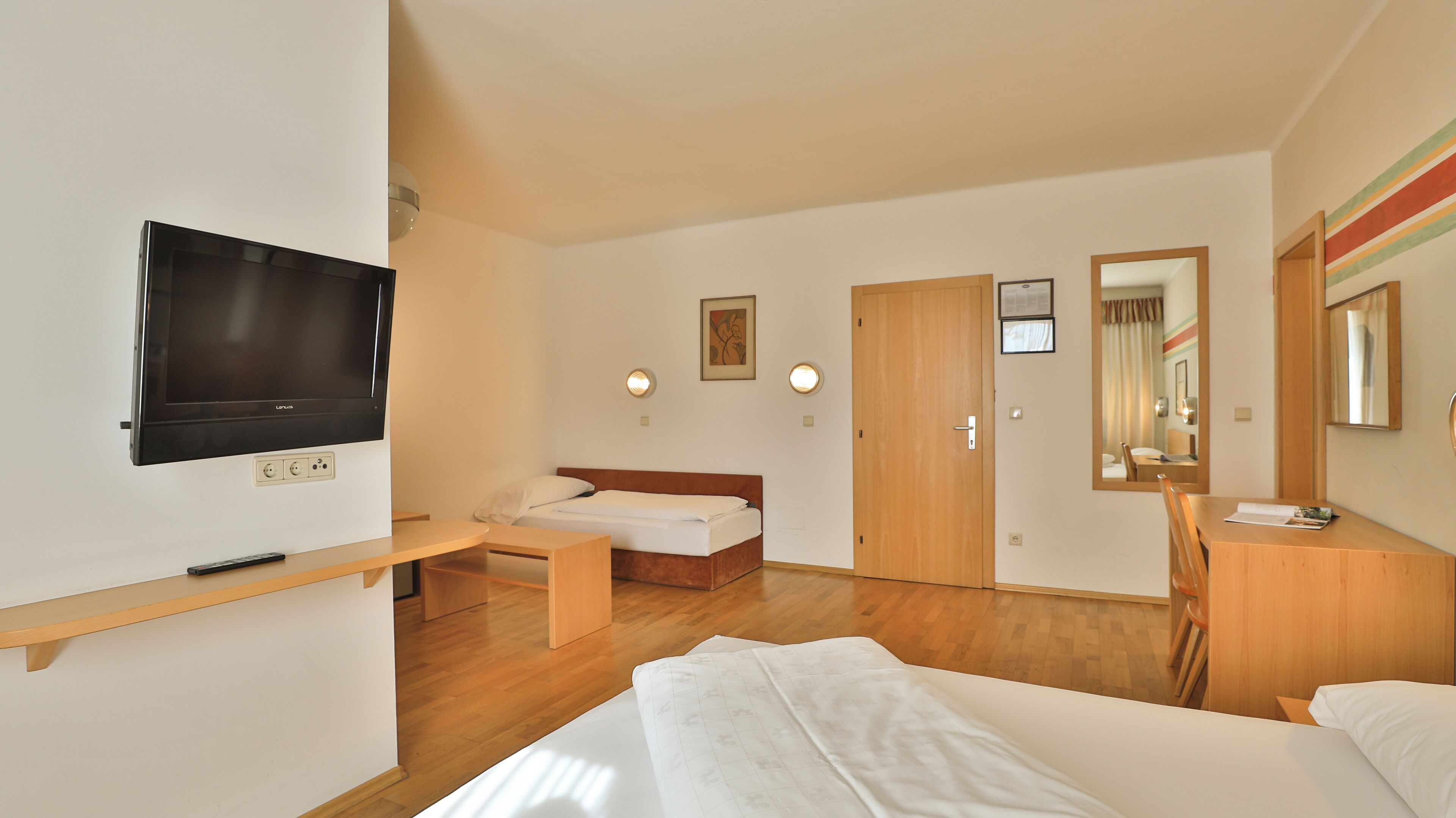 comfort quadruple room | in-room safe, free wifi, bed sheets