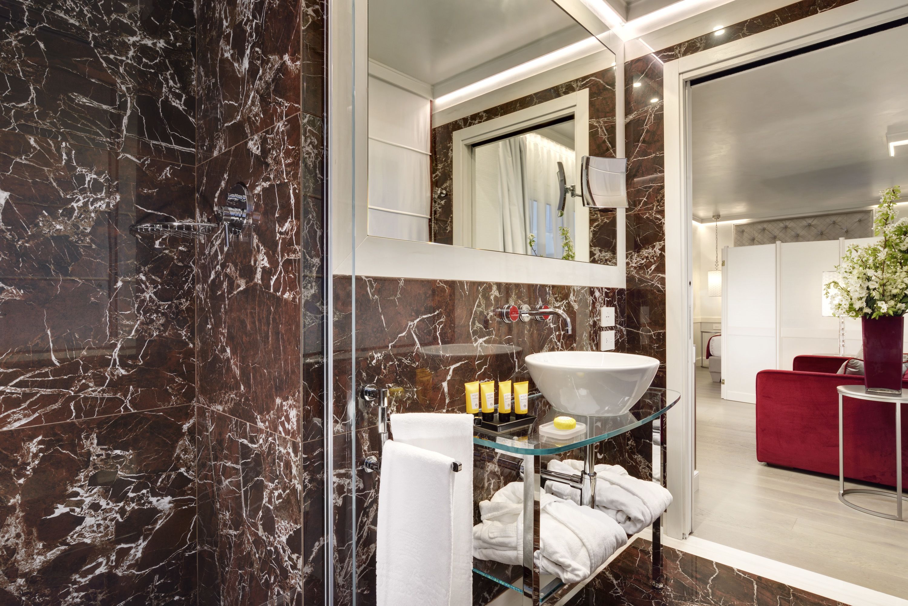 superior room | bathroom | rainfall showerhead, designer toiletries, hair dryer, bathrobes