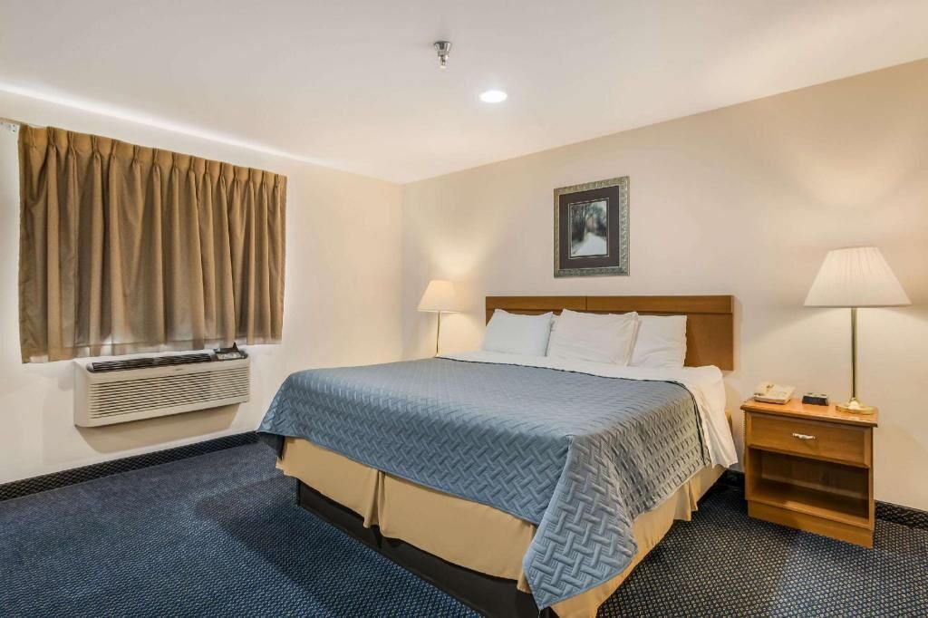 Premium bedding, desk, blackout curtains, iron/ironing board
