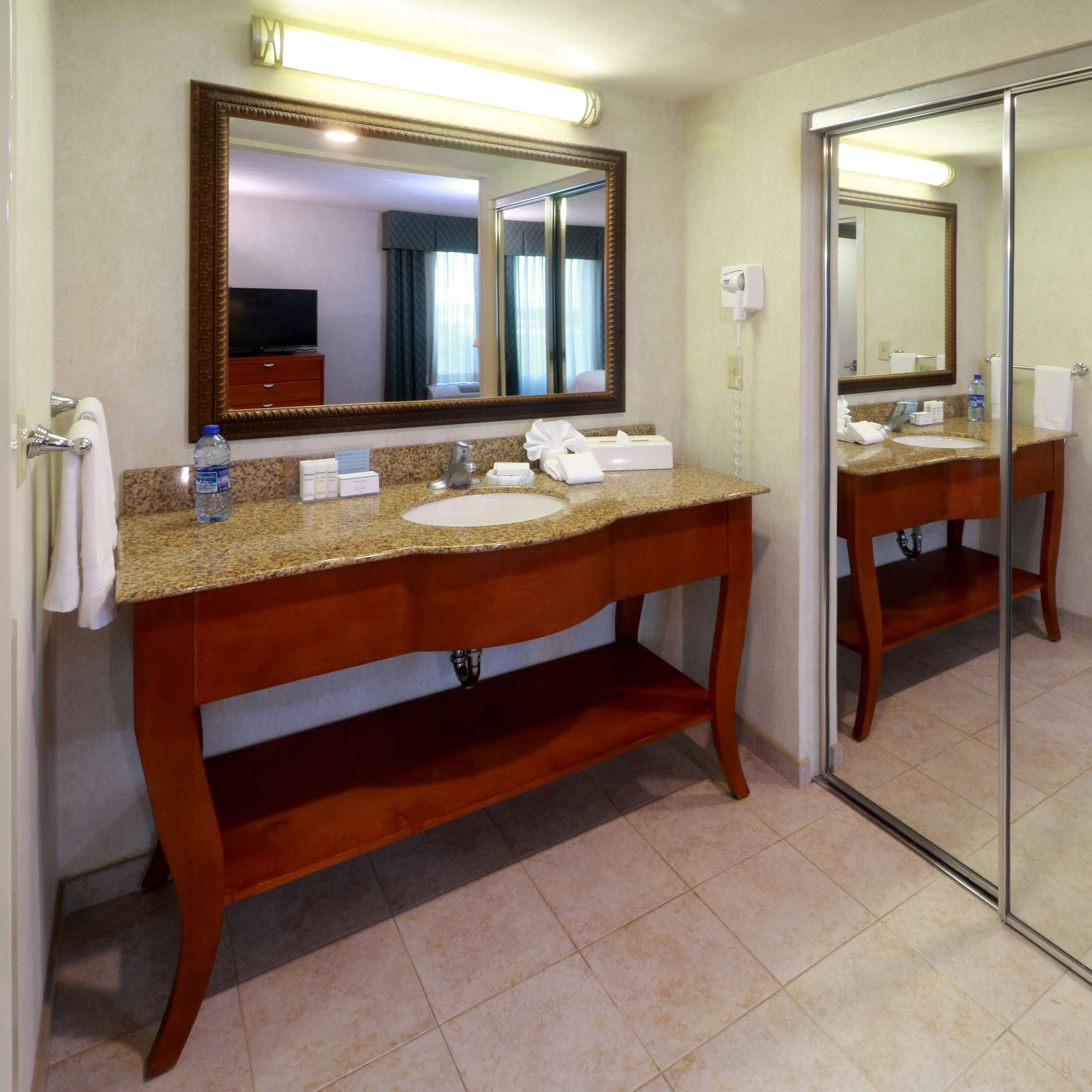 studio suite, 1 king bed | bathroom | shower, hair dryer, towels