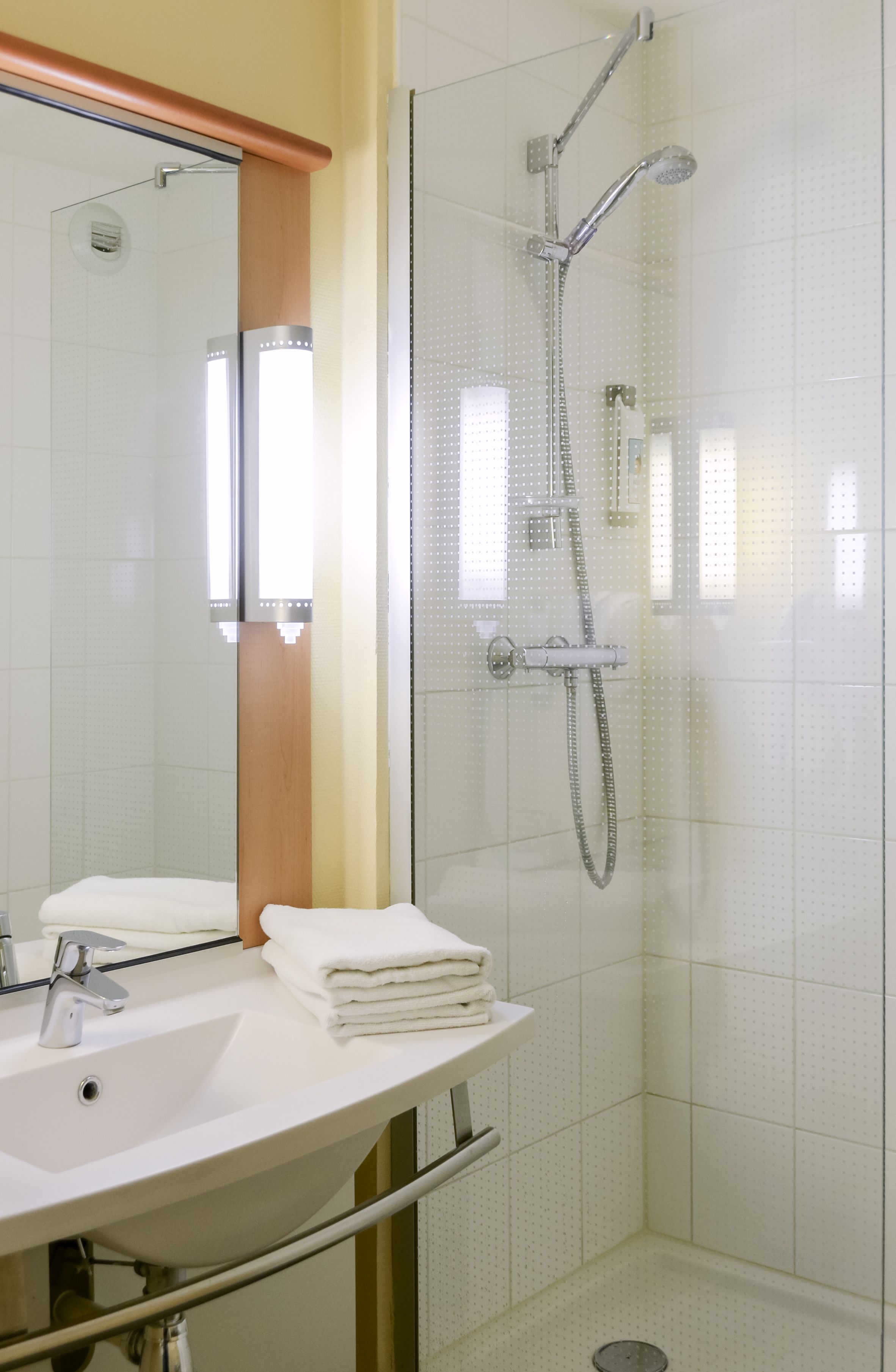 shower, eco-friendly toiletries, hair dryer, towels