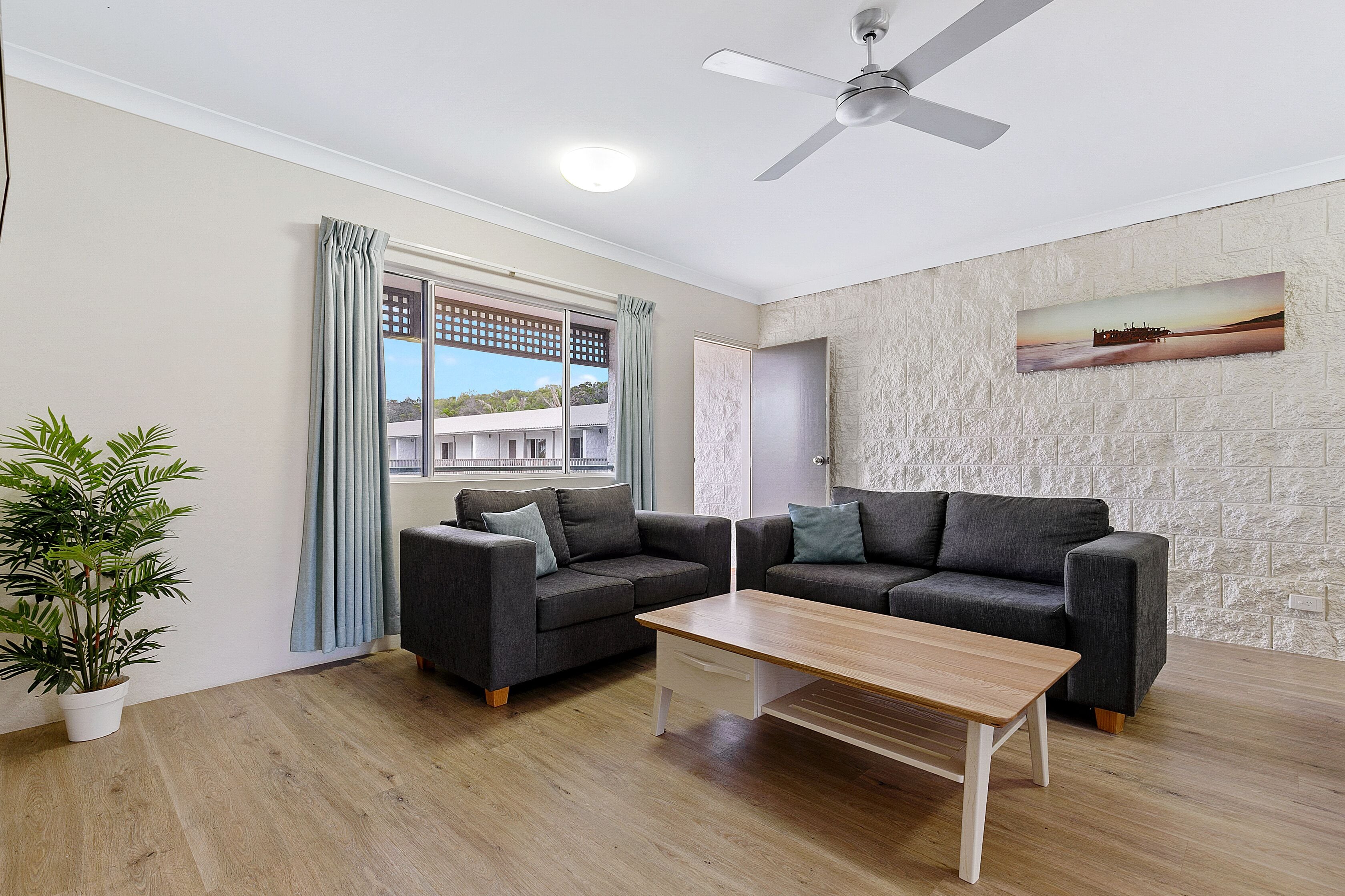 standard 2 bedroom apartment | living area | tv