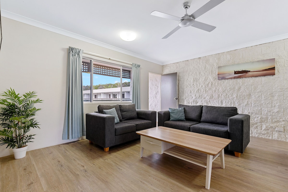 standard 2 bedroom apartment | living area | tv