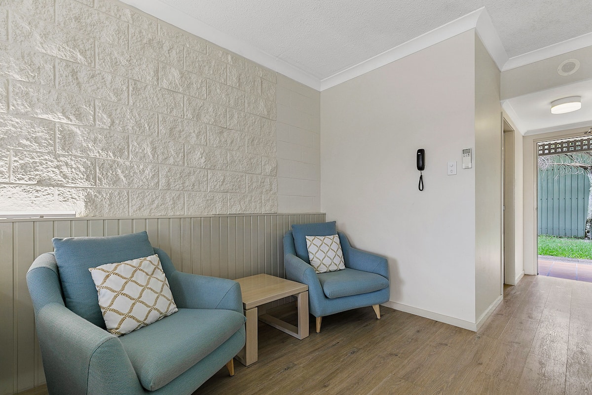 king resort hotel room | living area | tv