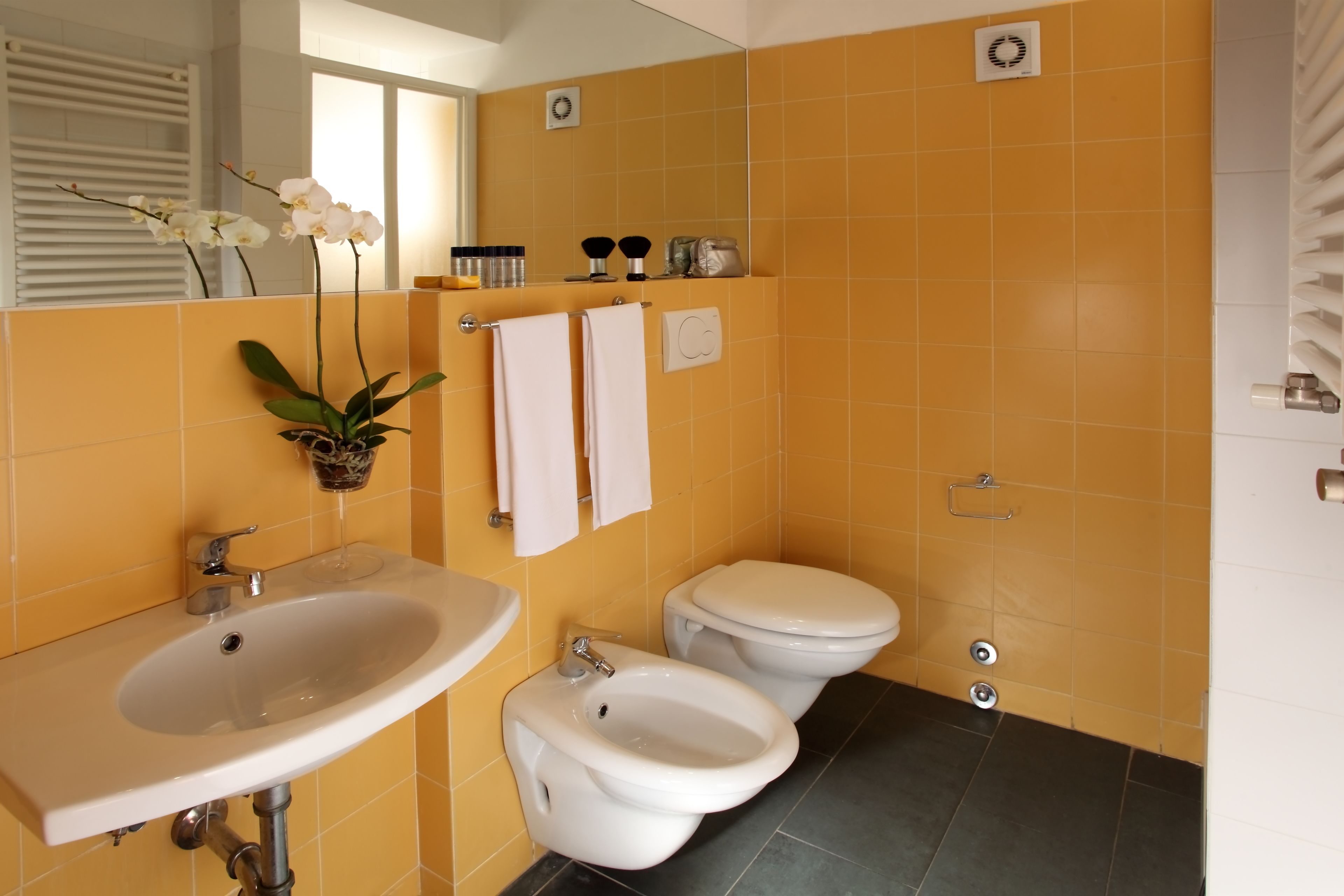 shower, rainfall showerhead, hair dryer, towels