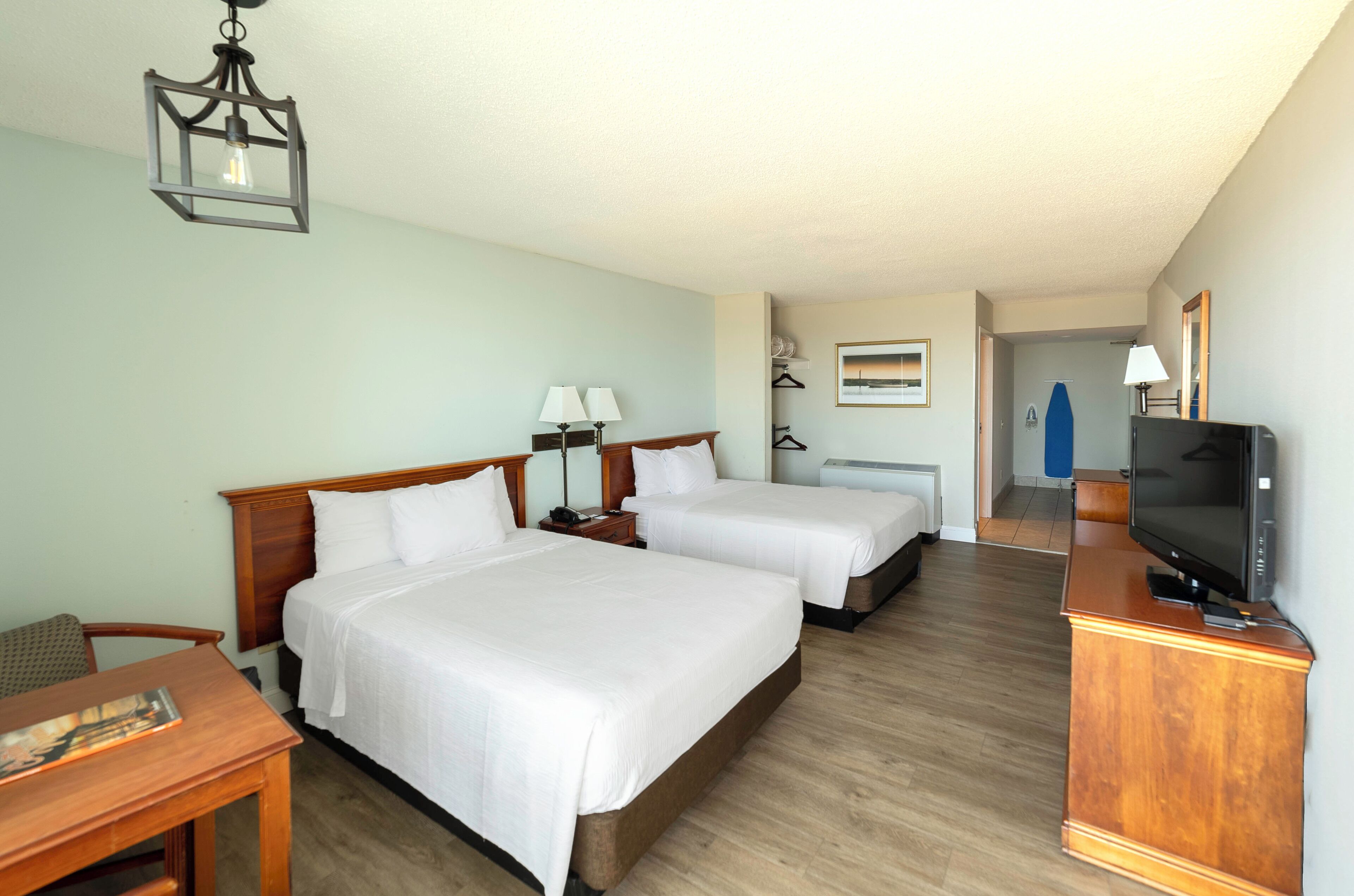 classic room, 2 double beds, balcony, ocean view | in-room safe, desk, laptop workspace, blackout curtains