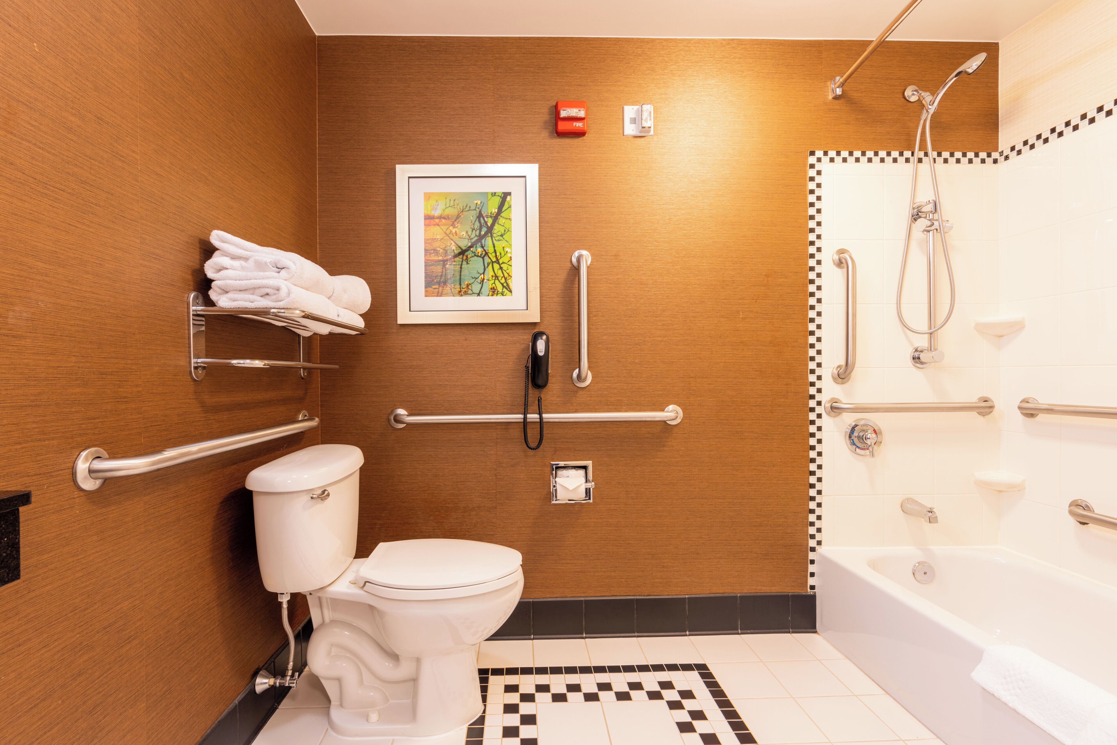 combined shower/bathtub, free toiletries, hair dryer, towels