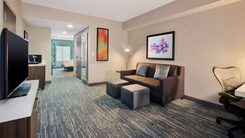 Junior Suite, One King Bed | Living area | 32-inch flat-screen TV with cable channels, TV, MP3 dock