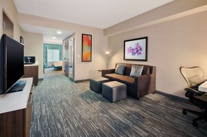 Junior Suite, One King Bed | Living area | 32-inch flat-screen TV with cable channels, TV, MP3 dock