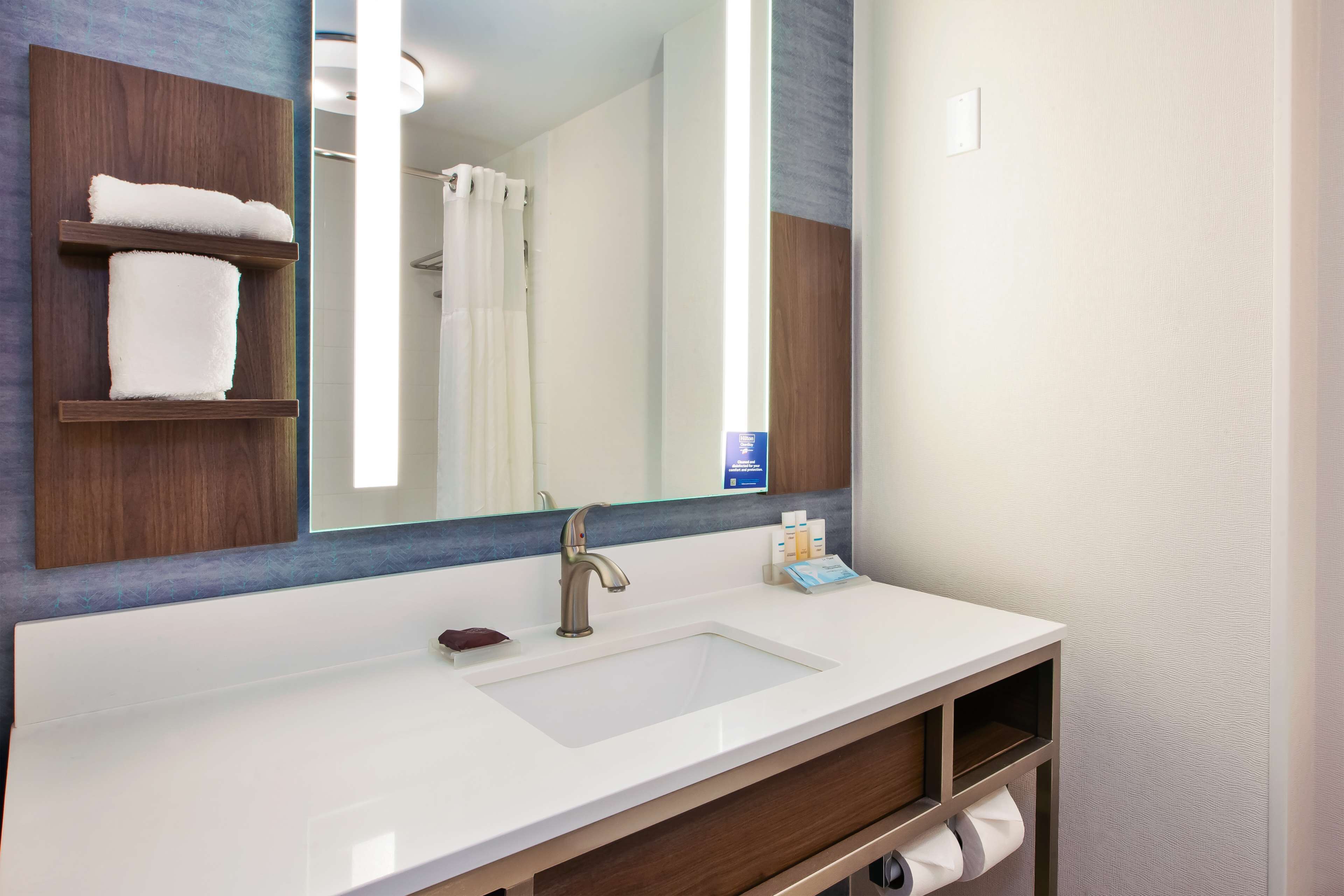 junior suite, one king bed | bathroom | free toiletries, hair dryer, bathrobes, towels