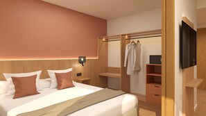 Een minibar, een kluis op de kamer, een bureau, een laptopwerkplek