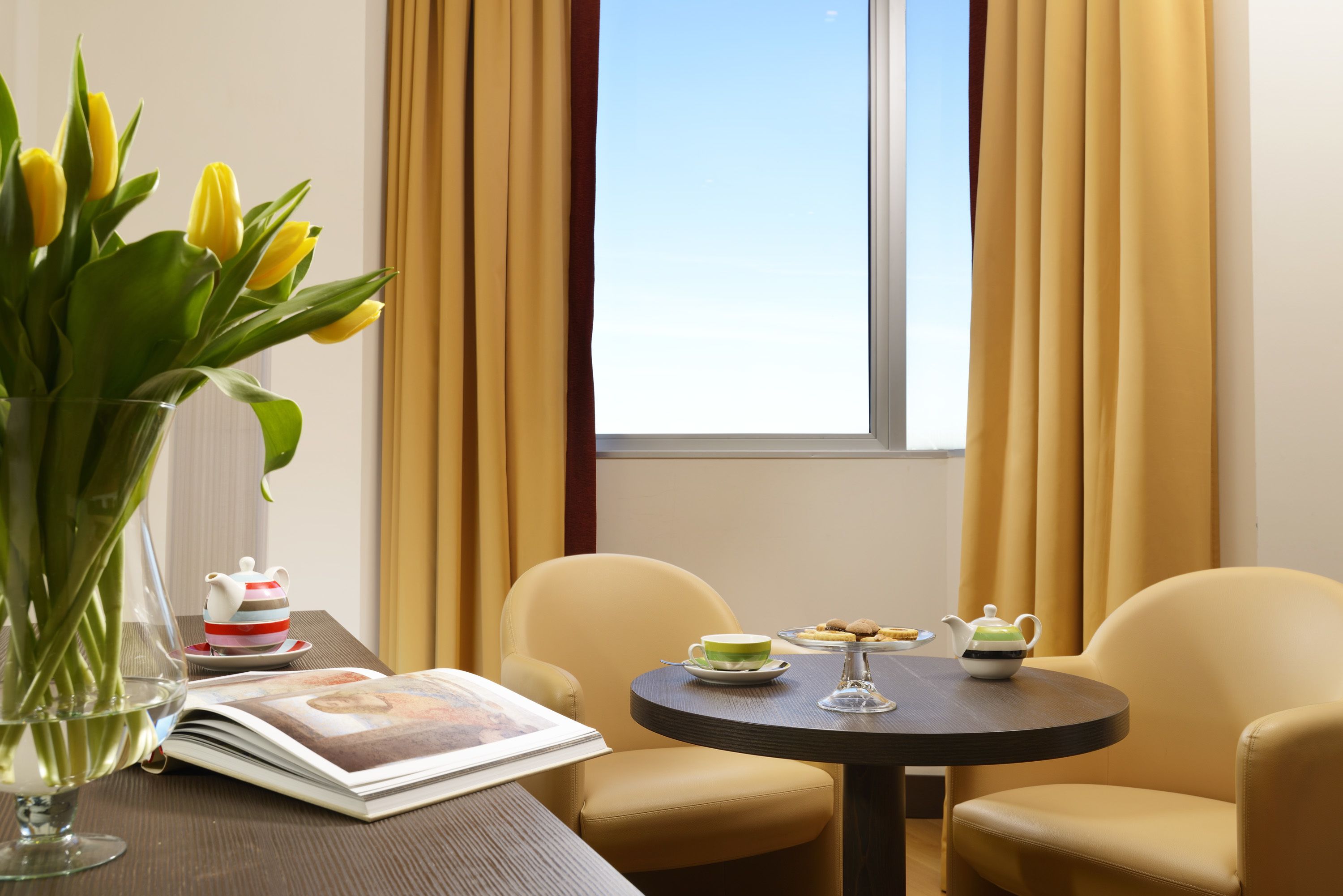 premium bedding, down duvets, minibar, in-room safe