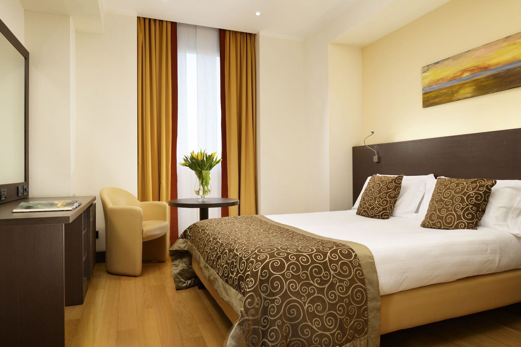 Premium bedding, down comforters, minibar, in-room safe