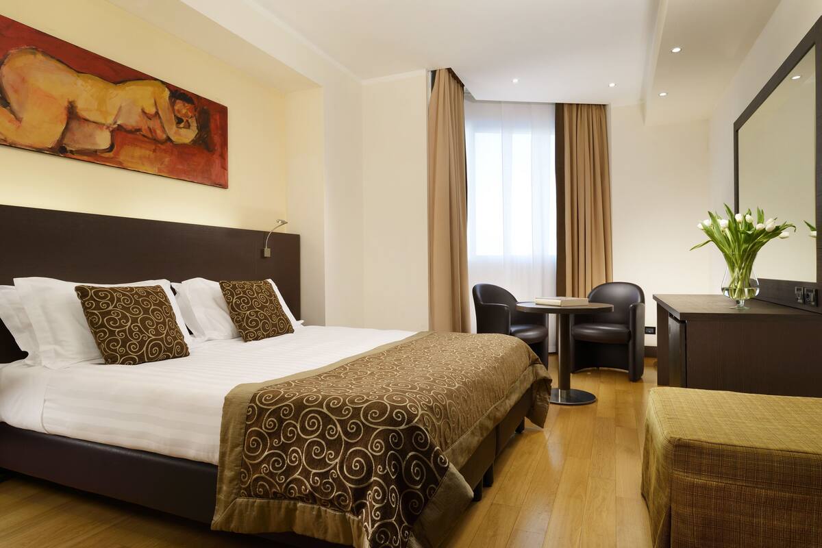 Premium bedding, down duvets, minibar, in-room safe