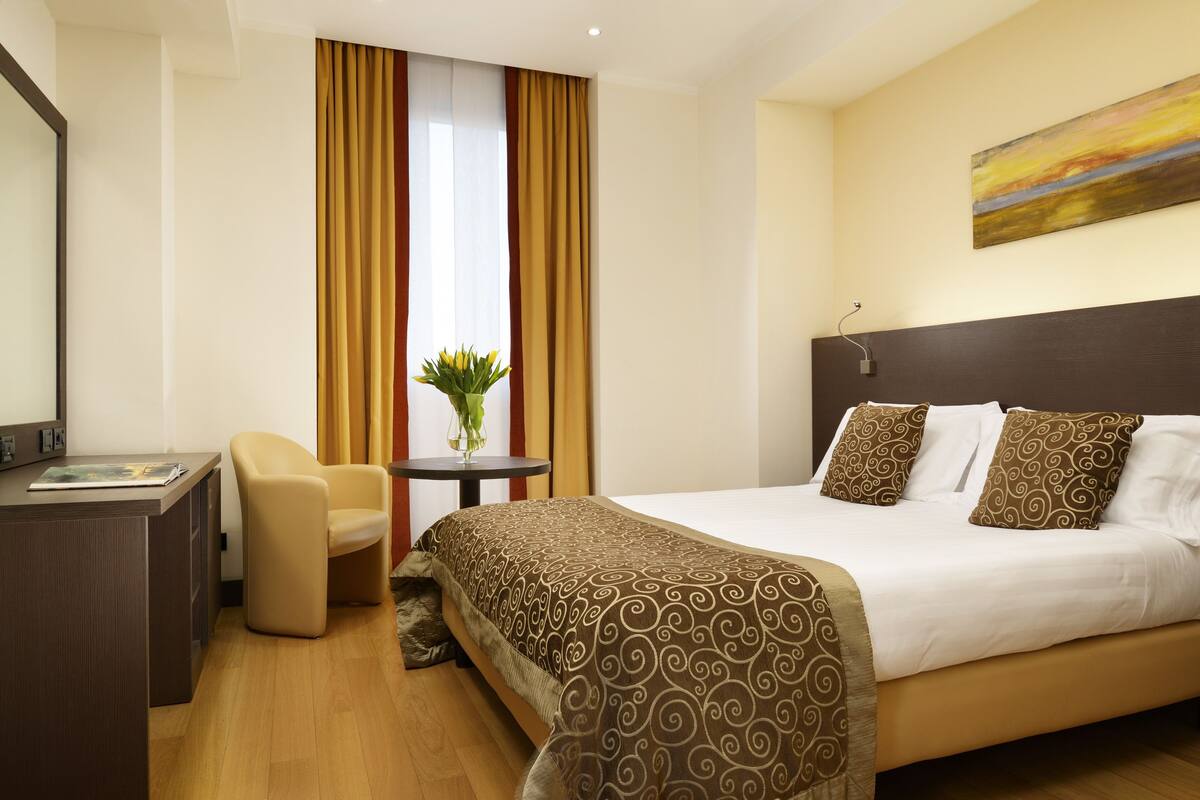 Premium bedding, down duvets, minibar, in-room safe