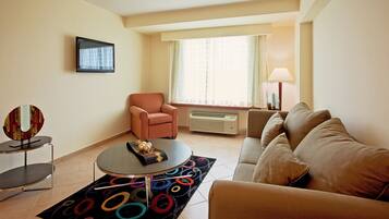 Suite, 1 King Bed | Premium bedding, in-room safe, desk, blackout drapes