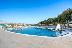2 outdoor pools, pool umbrellas, pool loungers