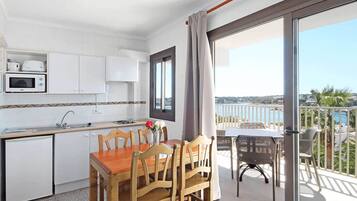 Apartment, 1 Bedroom, Balcony, Garden View | Private kitchen | Fridge, microwave, coffee/tea maker, electric kettle