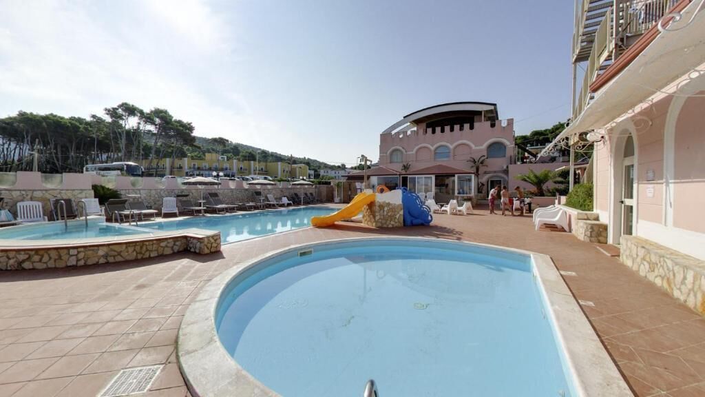 Seasonal outdoor pool, pool umbrellas, pool loungers