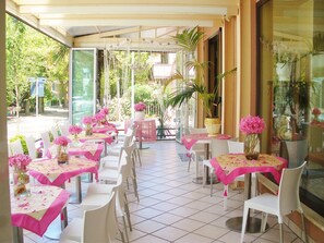 Breakfast, lunch, dinner served; local cuisine 