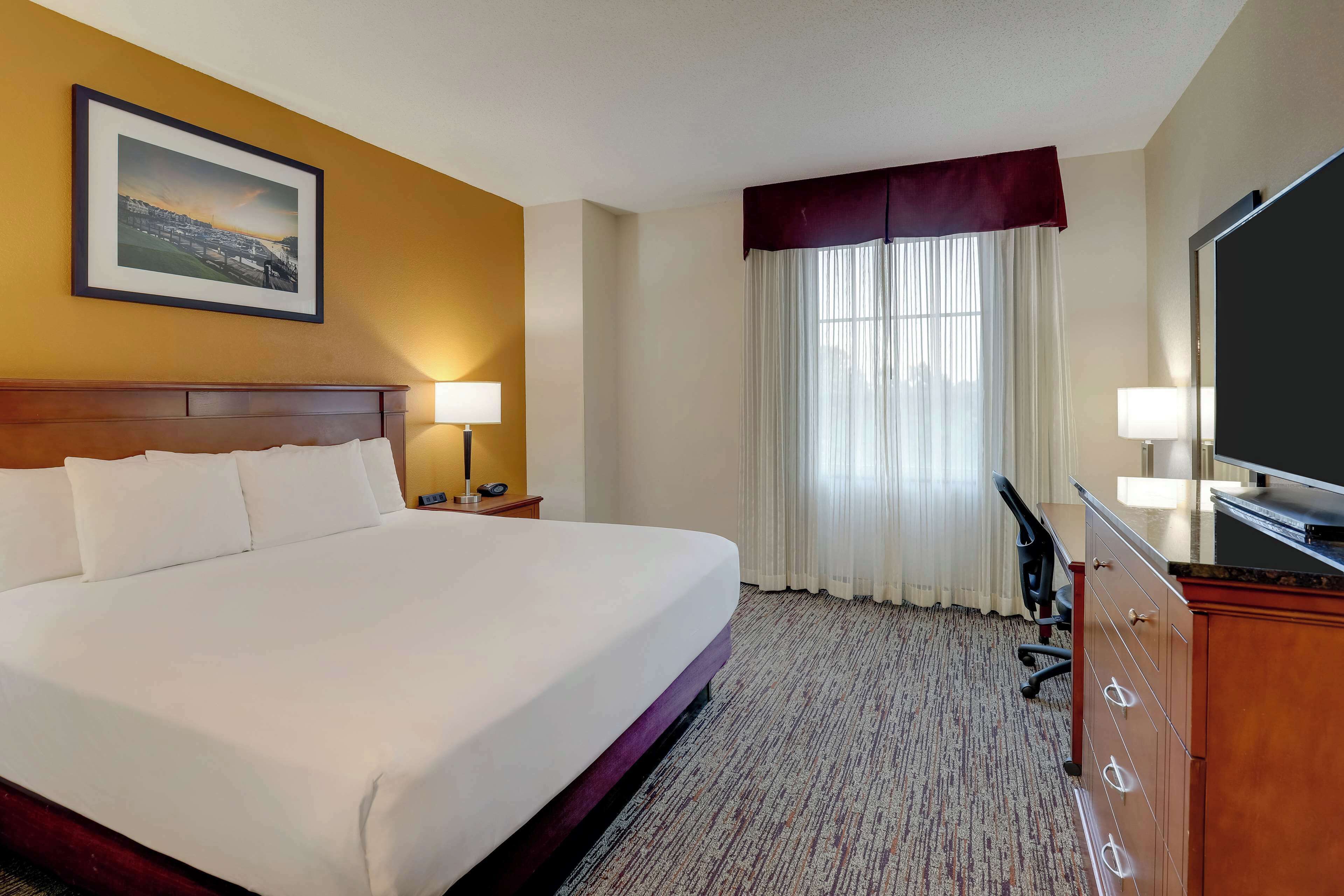 desk, blackout curtains, iron/ironing board, free cots/infant beds