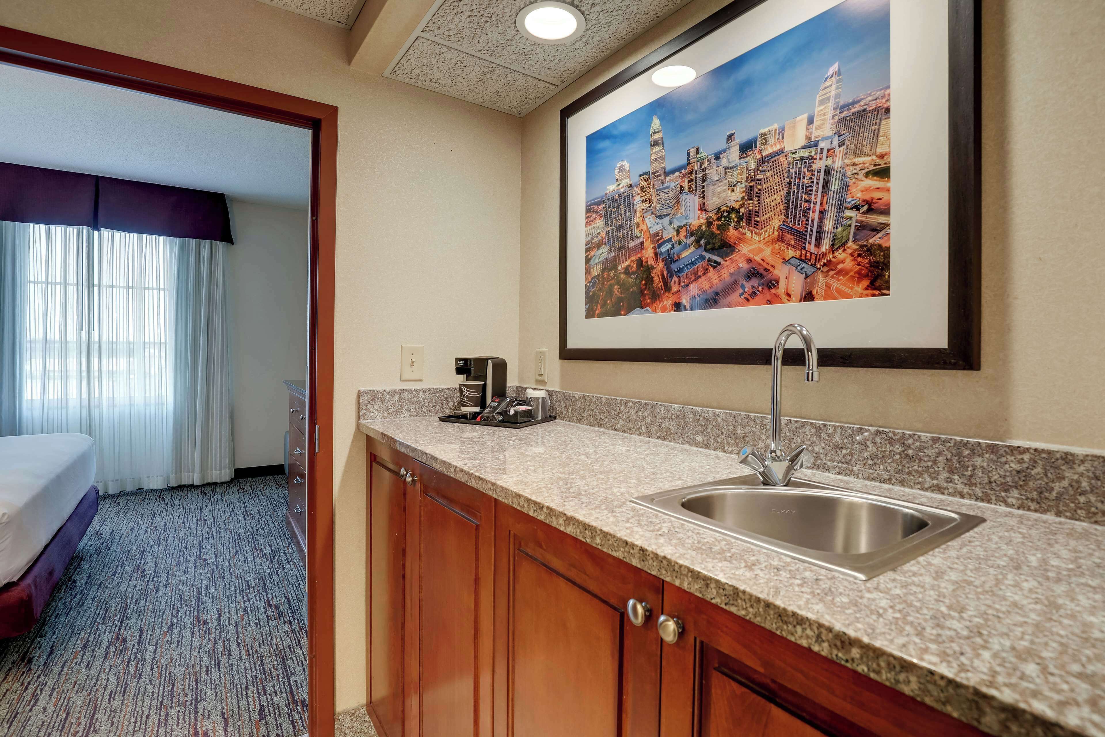 desk, blackout curtains, iron/ironing board, free cots/infant beds