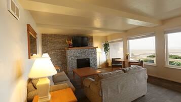 Een 42-inch flatscreentelevisie met kabelzenders