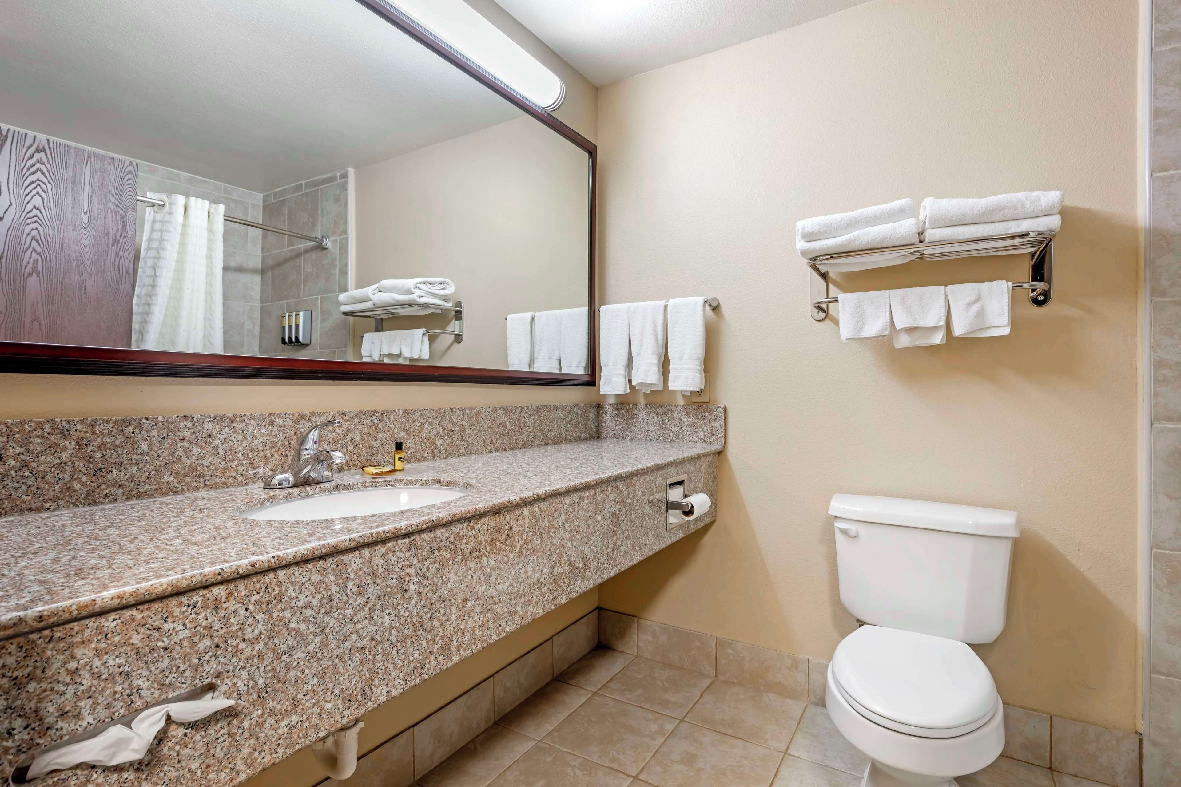 standard room, 2 queen beds, non smoking, refrigerator & microwave | bathroom | free toiletries, hair dryer, towels, soap