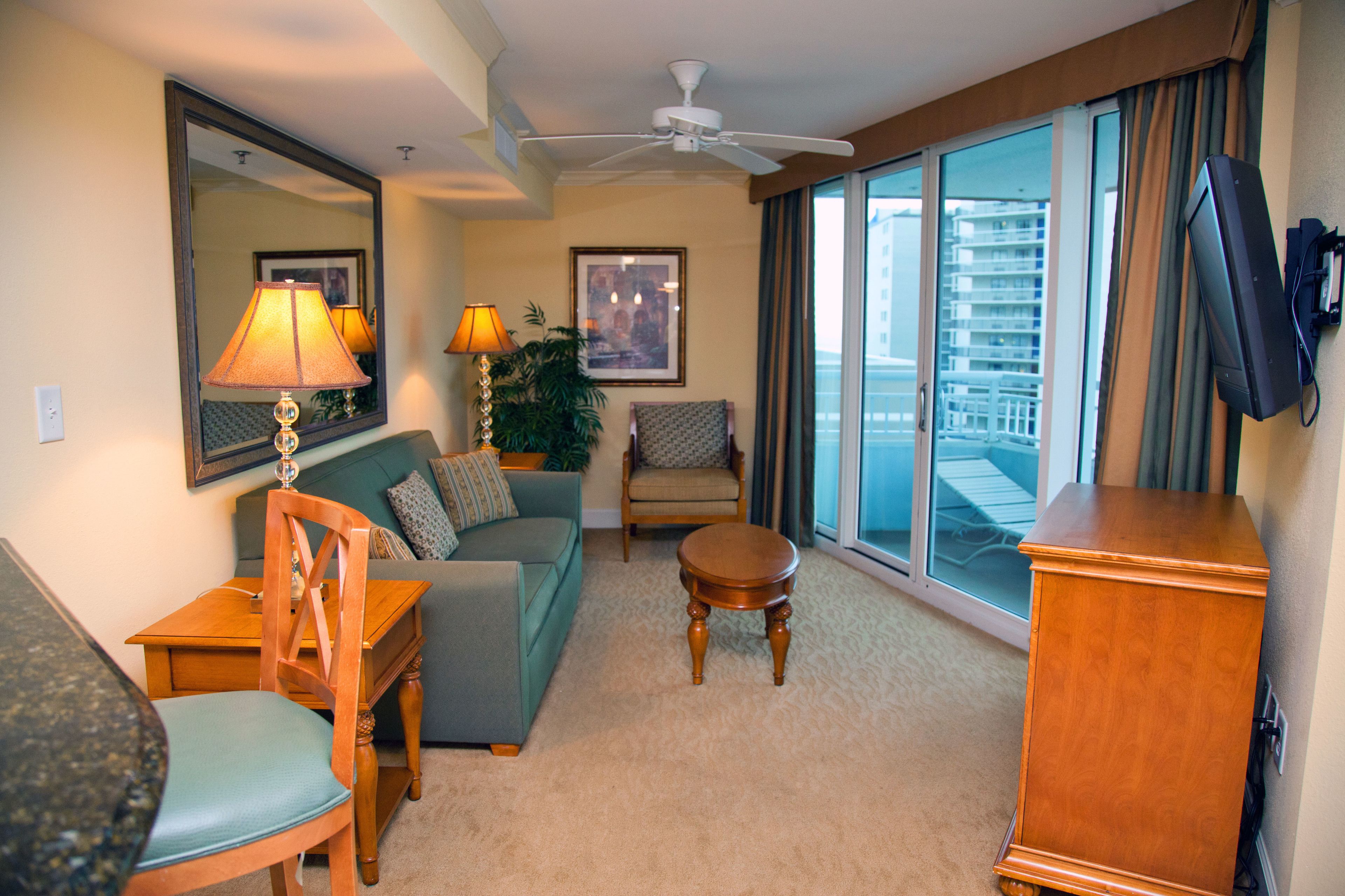 Standard Condo, 1 Bedroom, City View | Living room | Flat-screen TV, DVD player