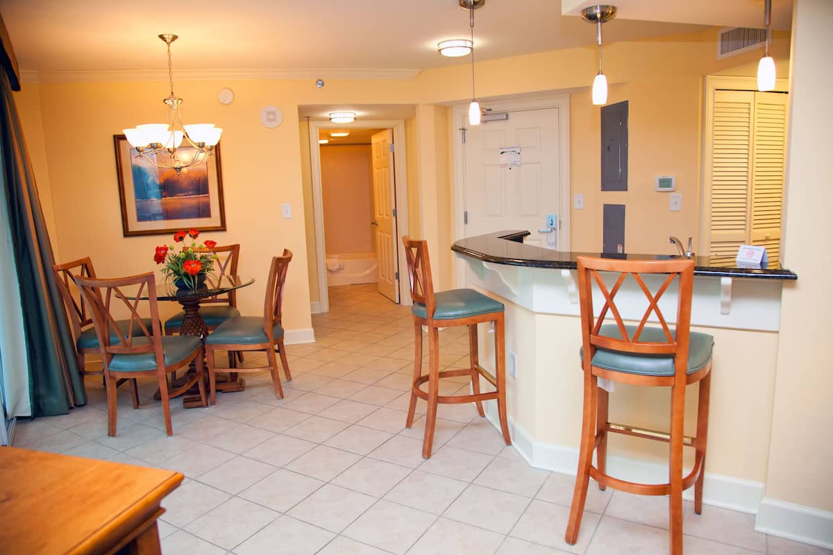Standard Condo, 1 Bedroom, City View | Living area | Flat-screen TV, DVD player