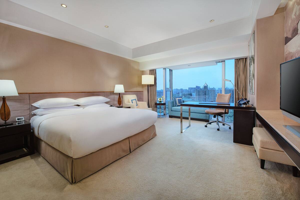 Ropa de cama de alta calidad, edredón y minibar 