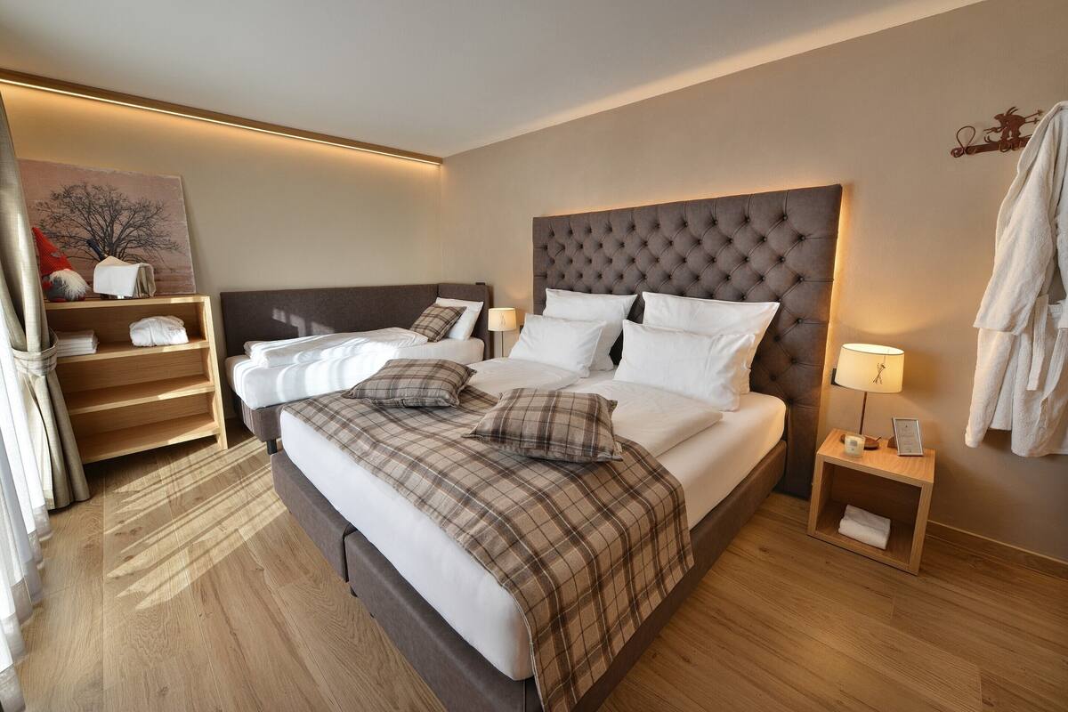Chambre Triple Deluxe | 1 chambre, literie hypoallergénique, couette en duvet d'oie
